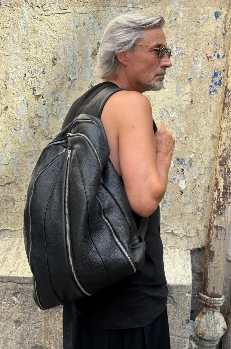 Multi-zipper backpack. 5