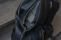 Multi-zipper backpack. 4