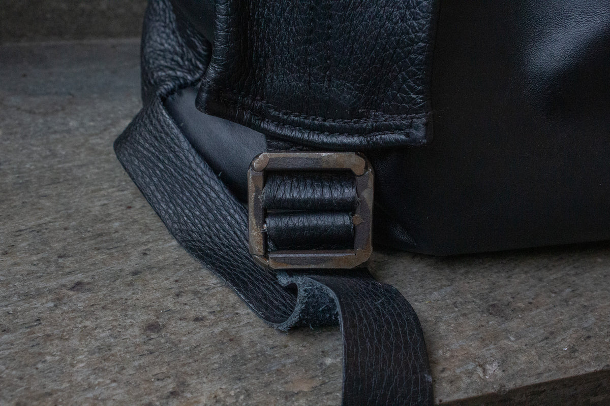 Multi-zipper backpack. 2