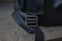 Multi-zipper backpack. 2